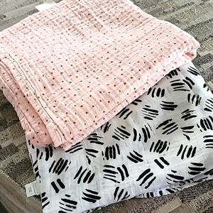 2 muslin swaddies/slings